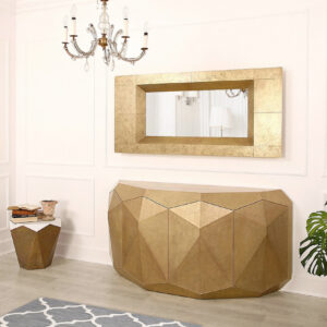 Lustro i komoda Allcut wykończone mosiężną blachą